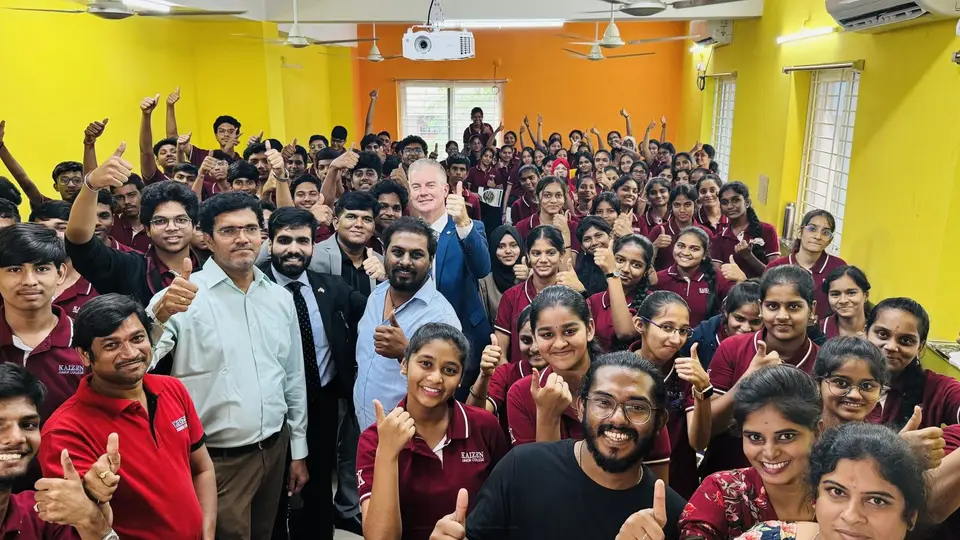 Kaizen students gathered with guests during an interactive session in the college hall
